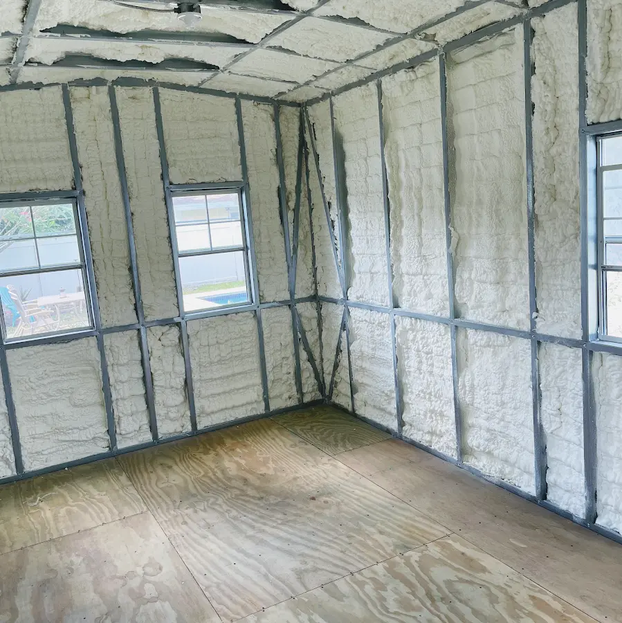 Closed-cell spray foam insulation applied to wall cavities in a residential project in Sunset Hills